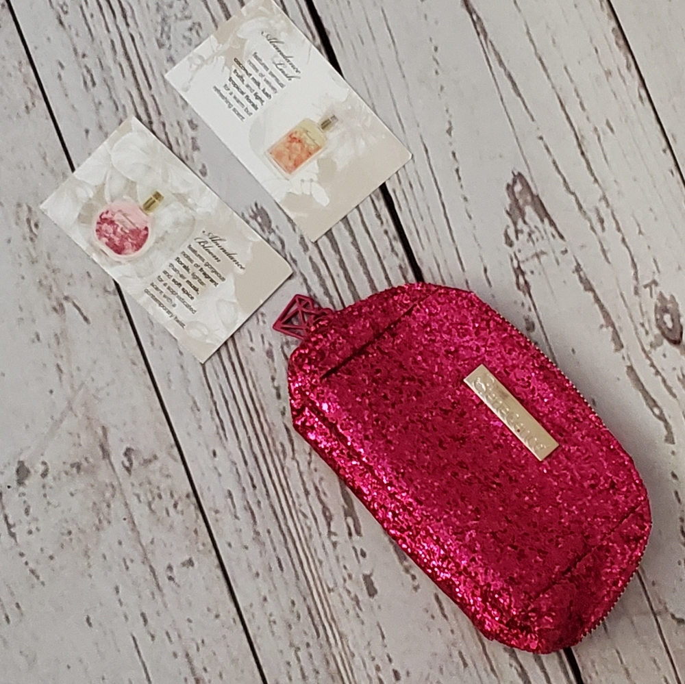 SeneGence pink glitter makeup bag with  perfume samples